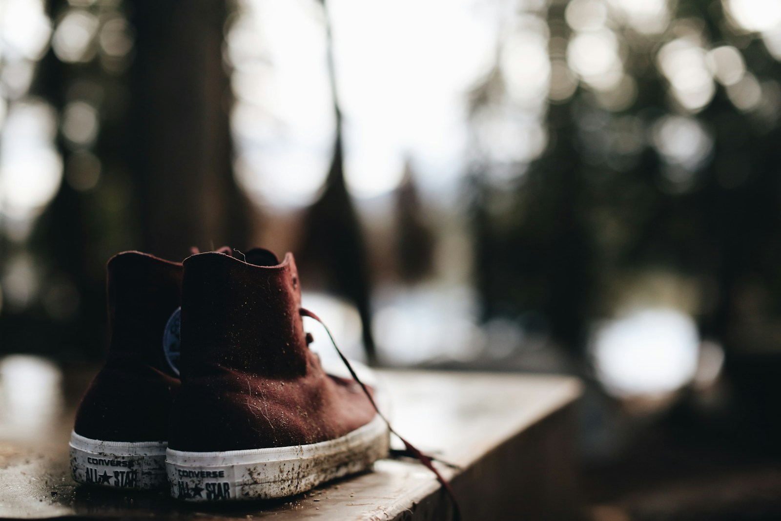 brown leather boots on brown wooden table