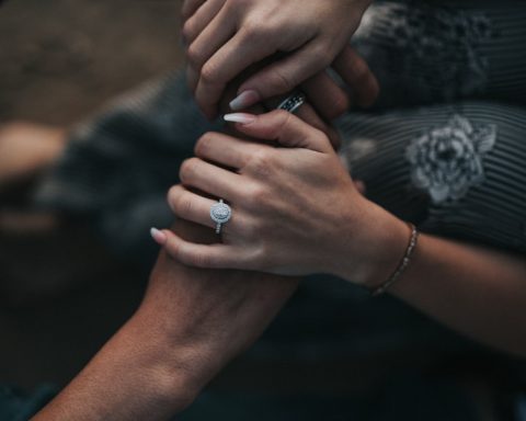 man and woman holding each others hands