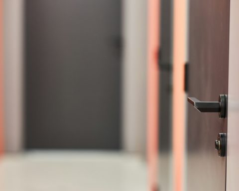 black and red rod in tilt shift lens