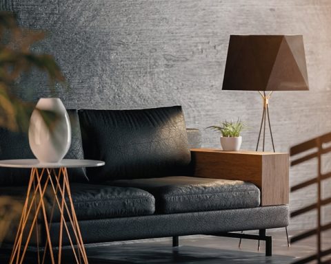 black and gray padded armchair beside brown wooden table